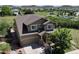 Beautiful two-story home featuring a well-manicured front yard, a two-car garage, and a welcoming front porch at 2815 Dreamcatcher Loop, Castle Rock, CO 80109
