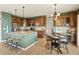 Beautiful kitchen with stainless steel appliances, central island, and breakfast table at 2815 Dreamcatcher Loop, Castle Rock, CO 80109