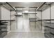 Walk-in closet with metal racks and shelving system for organized storage at 2815 Dreamcatcher Loop, Castle Rock, CO 80109
