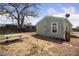 Exterior shot of the backyard with grass and a picnic table at 7221 E 66Th Pl, Commerce City, CO 80022
