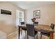 Dining room features marble table with seating for four and natural light at 7221 E 66Th Pl, Commerce City, CO 80022