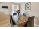 Dining room features marble table with seating for four and natural light at 7221 E 66Th Pl, Commerce City, CO 80022