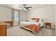 Inviting bedroom with cozy decor, plush carpeting, and natural lighting at 23920 E 34Th Ave, Aurora, CO 80019