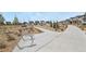 Community park featuring walking paths, greenery, benches and bike racks at 23920 E 34Th Ave, Aurora, CO 80019