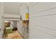 Utility room features water heater, plumbing, and storage space for household needs at 23920 E 34Th Ave, Aurora, CO 80019