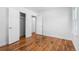 Simple bedroom with hardwood floors and double door closet at 1570 Xanthia St, Denver, CO 80220