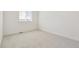 Bedroom featuring neutral carpet and white trim at 17959 Dandy Brush Ln, Parker, CO 80134