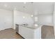 Modern kitchen island with granite countertops, stainless dishwasher, and pendant lighting at 17959 Dandy Brush Ln, Parker, CO 80134
