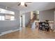 Open-concept living room featuring tile floors, staircase, and easy access to kitchen at 321 S 26Th Ave, Brighton, CO 80601