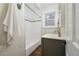 Cozy bathroom with white subway tile, mosaic accents, and updated vanity sink at 1633 Gaylord St, Denver, CO 80206