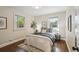 Serene bedroom featuring warm lighting, hardwood floors, and cozy decor for a relaxing retreat at 1633 Gaylord St, Denver, CO 80206