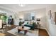 Inviting living room with neutral walls, hardwood floors and comfortable seating area at 1633 Gaylord St, Denver, CO 80206