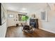 Comfortable living room featuring a fireplace and hardwood floors, perfect for entertaining at 1633 Gaylord St, Denver, CO 80206