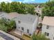 An aerial view of a home with a deck and fenced yard at 11845 W Tulane Dr, Morrison, CO 80465