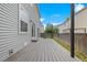 View of a wooden back deck featuring a railing and a small yard at 11845 W Tulane Dr, Morrison, CO 80465