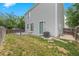 View of a back yard with small wooden deck, privacy fence, and an air conditioning unit at 11845 W Tulane Dr, Morrison, CO 80465