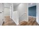 Hallway showcasing modern finishes and seamless flow between rooms at 11845 W Tulane Dr, Morrison, CO 80465