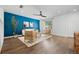 Spacious living room with hardwood floors, neutral decor, and lots of light at 11845 W Tulane Dr, Morrison, CO 80465