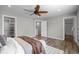 Spacious main bedroom featuring walk-in closet and ensuite bathroom at 11845 W Tulane Dr, Morrison, CO 80465