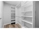 Organized walk-in closet with adjustable shelving for optimal storage at 11845 W Tulane Dr, Morrison, CO 80465