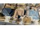 Overhead aerial view captures the home's layout, roof, and surroundings within its neighborhood at 275 Gold Maple St, Brighton, CO 80601