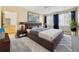 Comfortable main bedroom featuring a large bed, soft carpet, and natural light at 275 Gold Maple St, Brighton, CO 80601