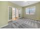 Inviting office space with French doors, a large window, and plush carpeting, ideal for remote work at 275 Gold Maple St, Brighton, CO 80601