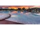 Large community pool with lounge seating and sun shades for residents to enjoy at 275 Gold Maple St, Brighton, CO 80601