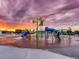 Colorful splash pad featuring slides and climbing structures for to play and cool off at 275 Gold Maple St, Brighton, CO 80601
