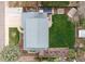 An aerial shot highlights the home's layout, including a large backyard and garden beds at 6930 S Yukon Way, Littleton, CO 80128