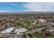 A sprawling suburban landscape showcases the neighborhood's greenery and community amenities at 6930 S Yukon Way, Littleton, CO 80128