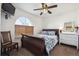 Spacious bedroom with a comfortable sleigh bed and plenty of closet space at 4806 Jericho Ct, Denver, CO 80249