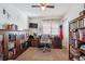 Home office with built-in bookshelves and plenty of workspace at 4806 Jericho Ct, Denver, CO 80249