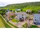 Aerial view showcasing the backyard, a patio and water feature and landscape design at 6950 Blue Mesa Ln, Littleton, CO 80125