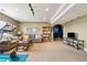 Spacious basement with an open layout, comfortable seating, and a dedicated entertainment area at 6950 Blue Mesa Ln, Littleton, CO 80125