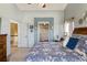 Relaxing bedroom with soft lighting and soothing color scheme for a serene atmosphere at 6950 Blue Mesa Ln, Littleton, CO 80125