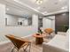 Cozy basement living room with stylish decor and plenty of space at 2880 Emporia Ct, Denver, CO 80238
