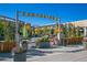 Attractive outdoor seating at Eastbridge town center is accented with a landscape and decorative planters at 2880 Emporia Ct, Denver, CO 80238