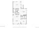 Detailed layout of the first floor showcasing the kitchen, living room, dining room and entry at 2880 Emporia Ct, Denver, CO 80238