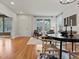 Open-concept living area with hardwood floors and lots of natural light at 2880 Emporia Ct, Denver, CO 80238