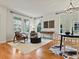 Bright living area with hardwood floors, large windows, and stylish furnishings at 2880 Emporia Ct, Denver, CO 80238