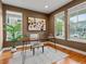 Bright office space with wood floors and ample natural light from large windows at 2880 Emporia Ct, Denver, CO 80238