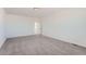 Bright bedroom with plush carpeting and white walls, providing a serene atmosphere at 2916 Oxley St, Strasburg, CO 80136