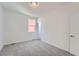Light and airy bedroom with neutral carpet, large window and a modern design at 2916 Oxley St, Strasburg, CO 80136