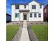 Charming two-story home with landscaped yard and welcoming front porch at 2916 Oxley St, Strasburg, CO 80136