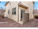 Exterior view of home featuring a patio and gravel landscaping at 3815 Red Deer Trl, Broomfield, CO 80020