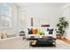 Inviting living room featuring modern decor, stylish furnishings, and ample natural light at 3815 Red Deer Trl, Broomfield, CO 80020
