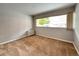 Bright bedroom with carpet flooring and a large window for natural light at 888 N Logan St # 2C, Denver, CO 80203