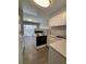 Kitchen with view to living room at 888 N Logan St # 2C, Denver, CO 80203