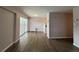 Cozy living room with sliding glass doors and contemporary laminate flooring at 888 N Logan St # 2C, Denver, CO 80203